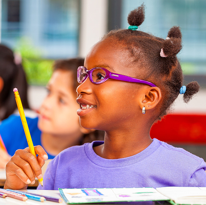 a school girl wearing glasses