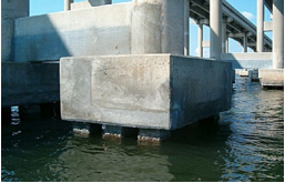 The concrete in this coastal bridge must withstand exposure to salt water for decades.