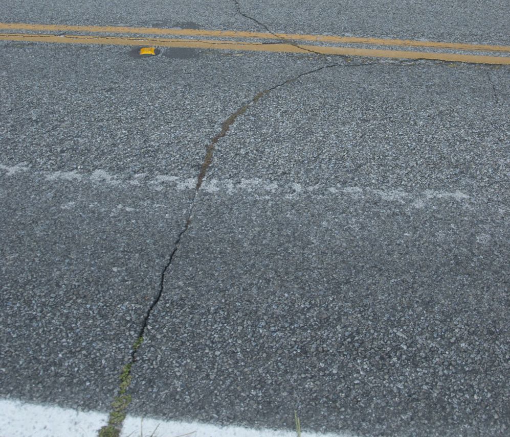 Load-induced fatigue damage shows up as cracks on a road. Photo credit: UFTI/T2 Center