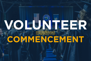 Volunteer during Commencement [Photo of graduates in the background]