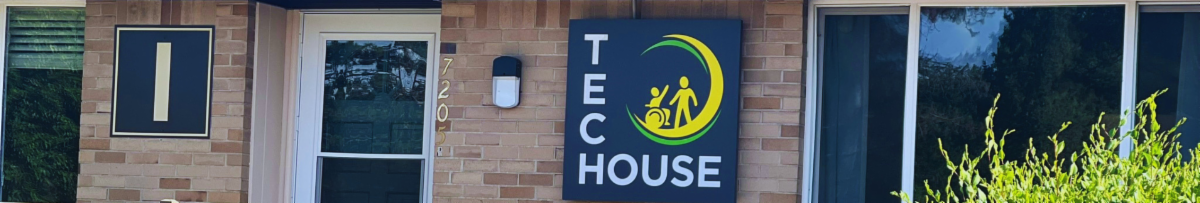 Exterior entrance of Sunshine Communities' Tech House featuring signage outside Building I in Maumee, Ohio.