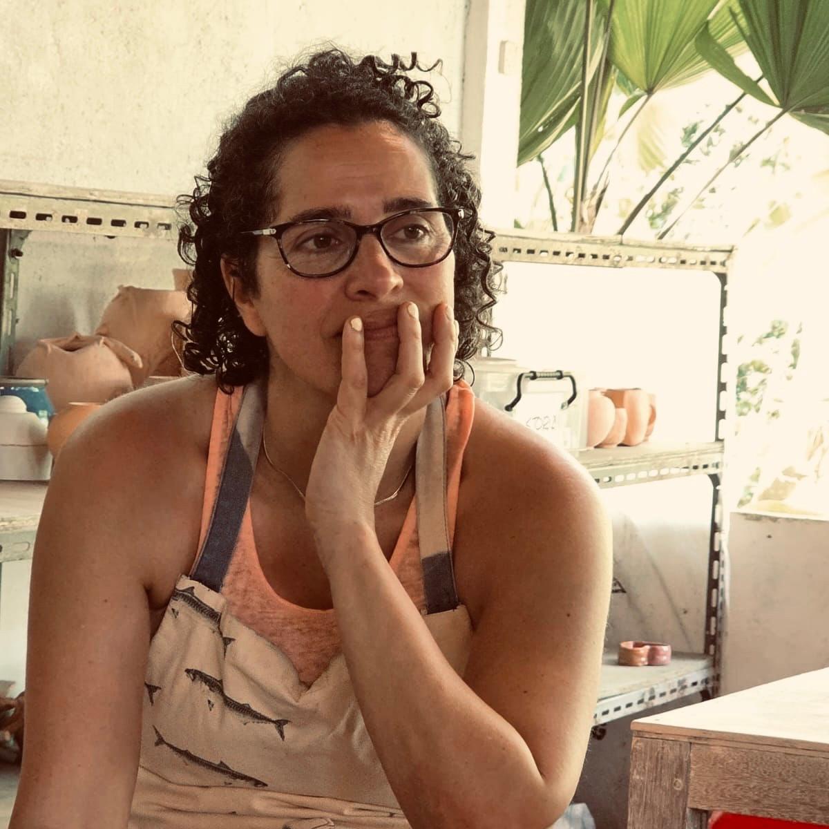 Arilella the founder of Slip Studio a Clap & Pottery Studio In white plans NY.  On a trip To Ubid, Bali