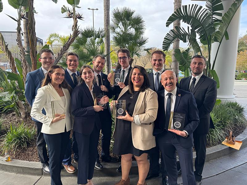 ICBSC students with trophies and palm trees in Anaheim, CA