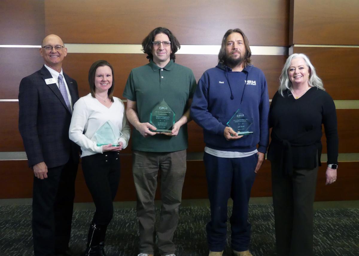 Mayor Jack McCarty and City Manager Paulette Hartman pose with award finalist Sabrina Marcum, winner Michael Spagnuolo and finalist Jeff Reid.
