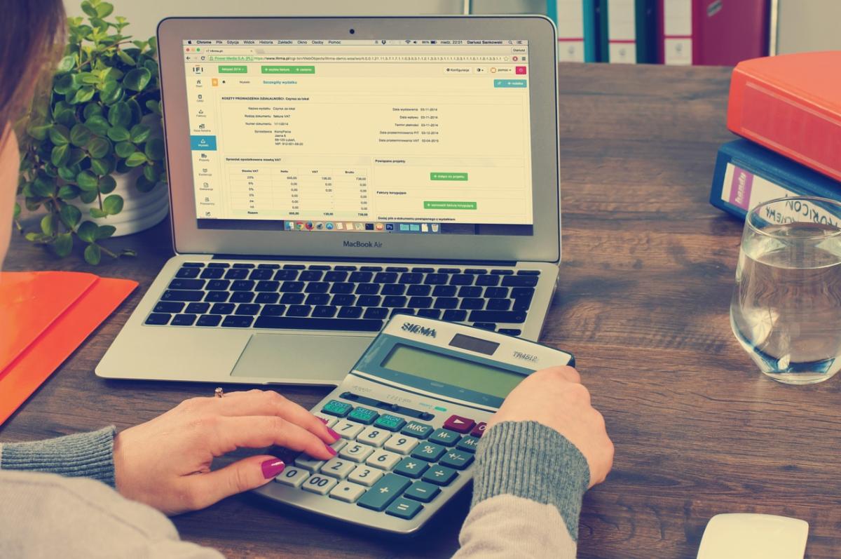 computer and calculator on desk