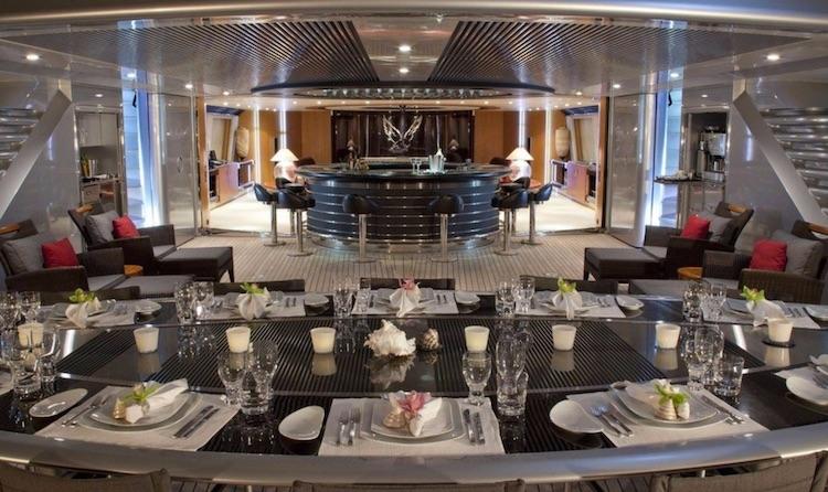 Luxurious dinner table and bar on 289ft MALTESE FALCON sailing yacht