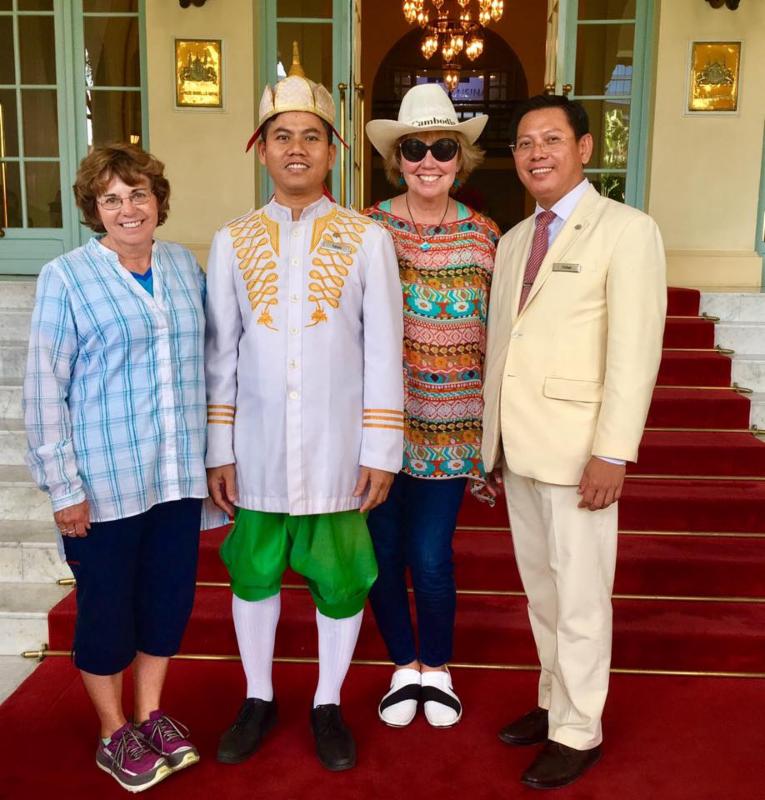 Carol and Karen Shea Saying good-bye to our hosts at luxurious Raffles hotel in Phnom Penh_ Cambodia