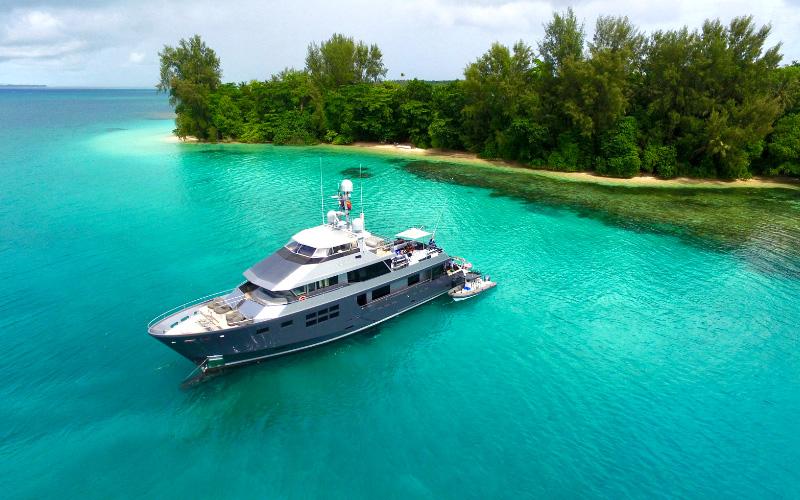 112ft Alloy Yacht AKIKO motor yacht anchored of atoll in The Maldives 
