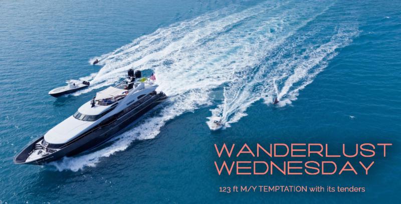 123ft motor yacht TEMPTATION at sea flanked by its jet skis and boat