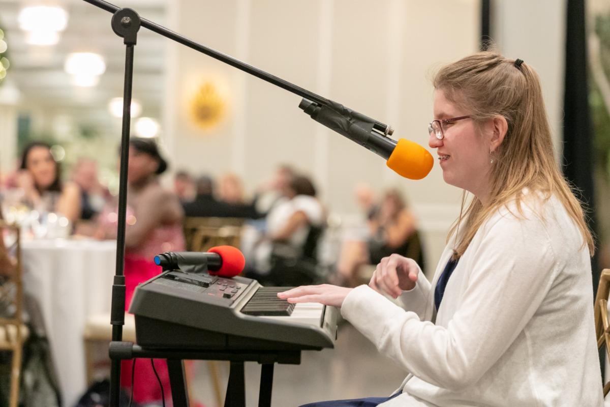 Kaitlyn Deverson playing piano