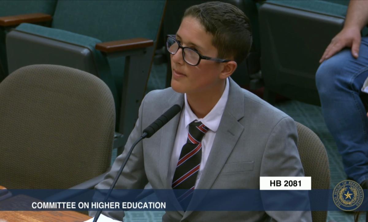 A young person in a gray suit white shirt and striped tie speaks into a microphone while testifying before the Texas House Committee on Higher Education. The text overlay on the screen reads COMMITTEE ON HIGHER EDUCATION and HB 2081 along with the seal of 