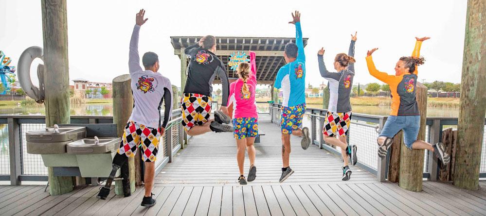 people jumping in photo wearing pirate shorts and shirts