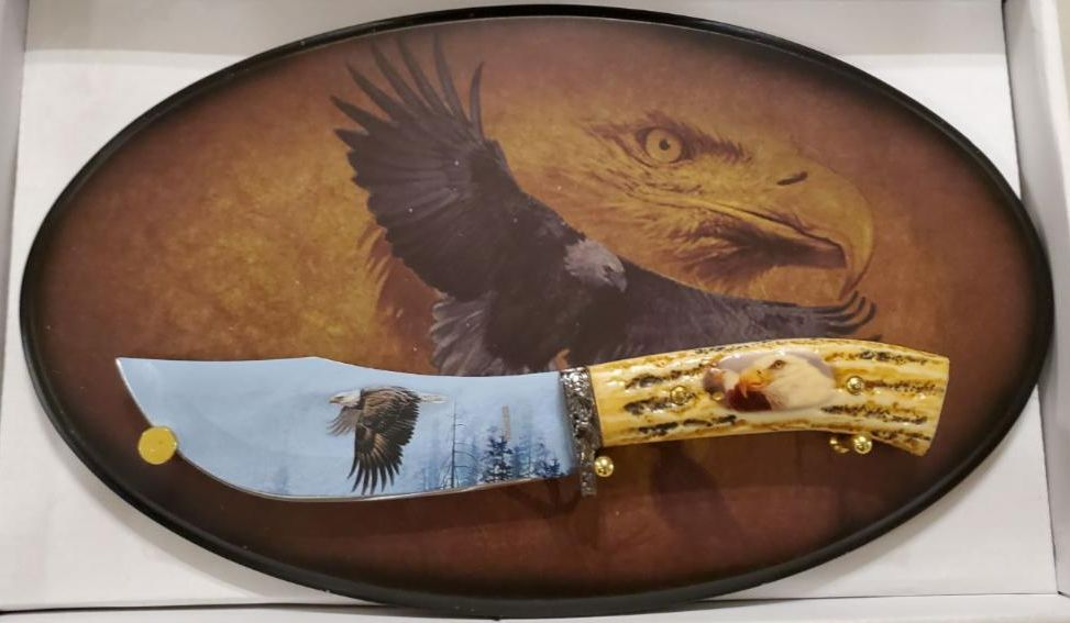 bone handle knife with eagle image