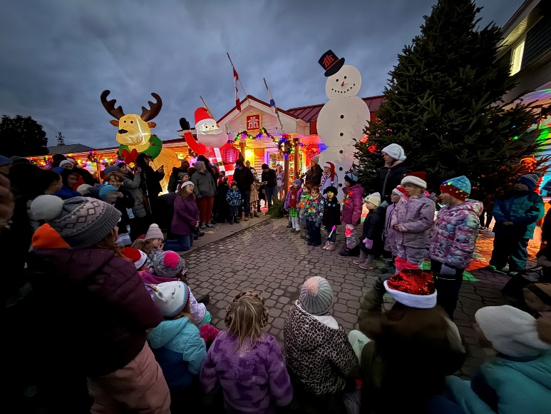 Glee, a local kids’ choir, performing festive tunes before the Christmas in the Bay tree is lit