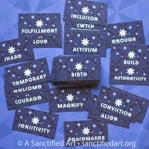 assorted Star Words cards scattered on an indigo background