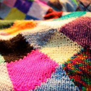 Stock photo of a colorful knitted blanket