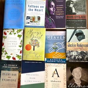 Assorted books laid out on a table