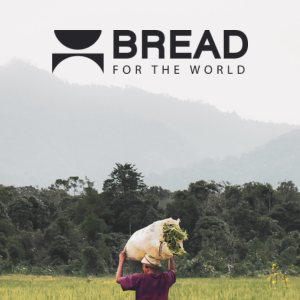 Bread for the World logo in the sky above a person carrying grain in a field
