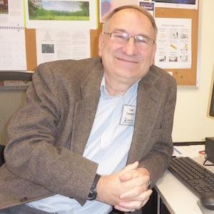 Smiling headshot of author Todd Compton