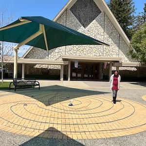 Photo of someone walking in a rope labyrinth in Trinity Court at SVPC