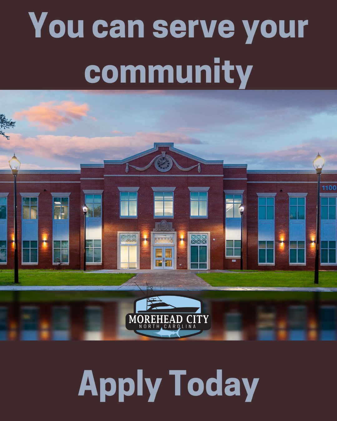 A two story brick building at dusk with text and the Morehead City logo