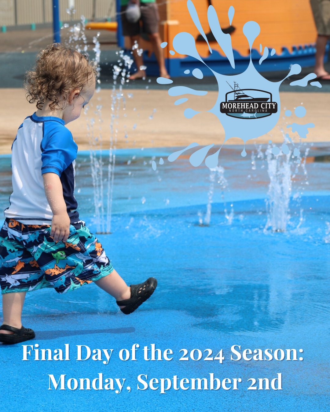 A toddler boy in swim trunks swim shirt and crocs walks through a splash pad with text overlay