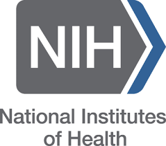 Image Description: NIH logo. White "NIH" in gray background with blue arrow, gray text below reads "National Institutes of Health."