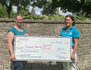 Bridget Ryan from Erin Horse Day donates to Equine Guelph
