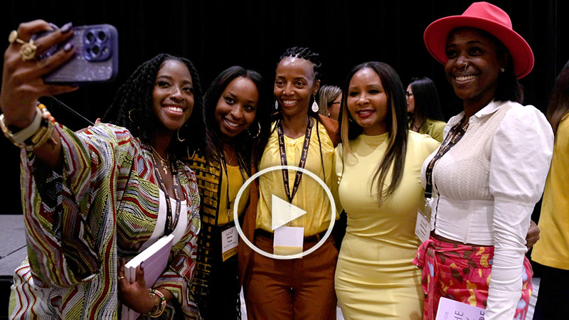 Five ladies take a group selfie.