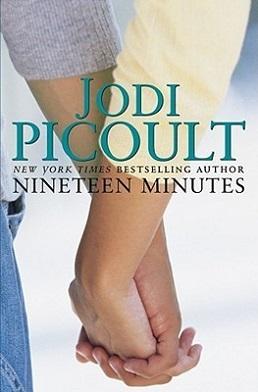 Book cover showing two people holding hands, with the title âJodi Picoultâ and âNineteen Minutesâ and a subtitle line beneath the author name.