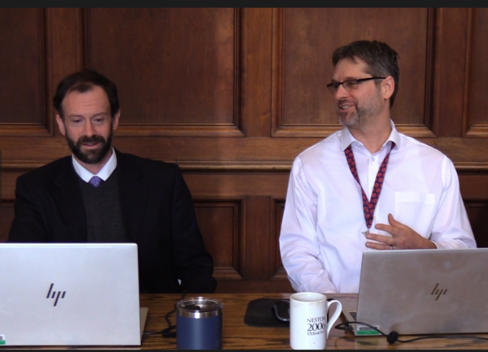 john gortakowski and john demeter sit with their laptops, presenting