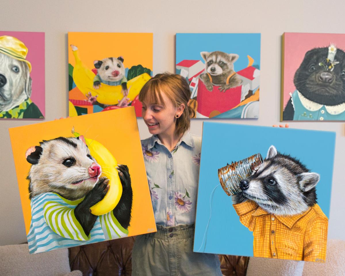 Artist Becca Lane with her animal painting creations