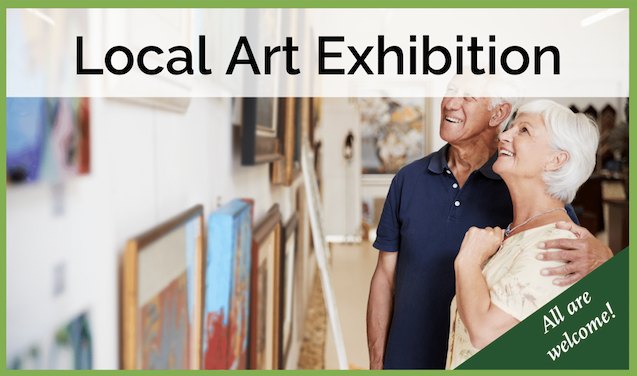 Two people looking at art in a gallery