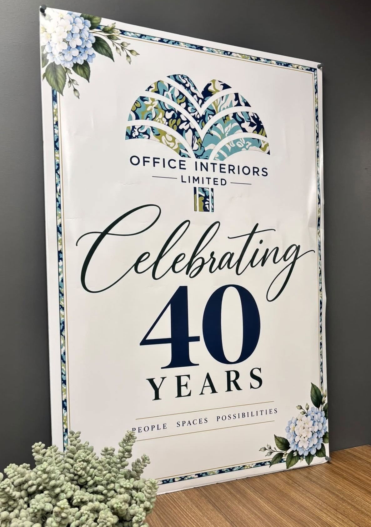 Sign celebrating 40th years of Office Interiors Limited