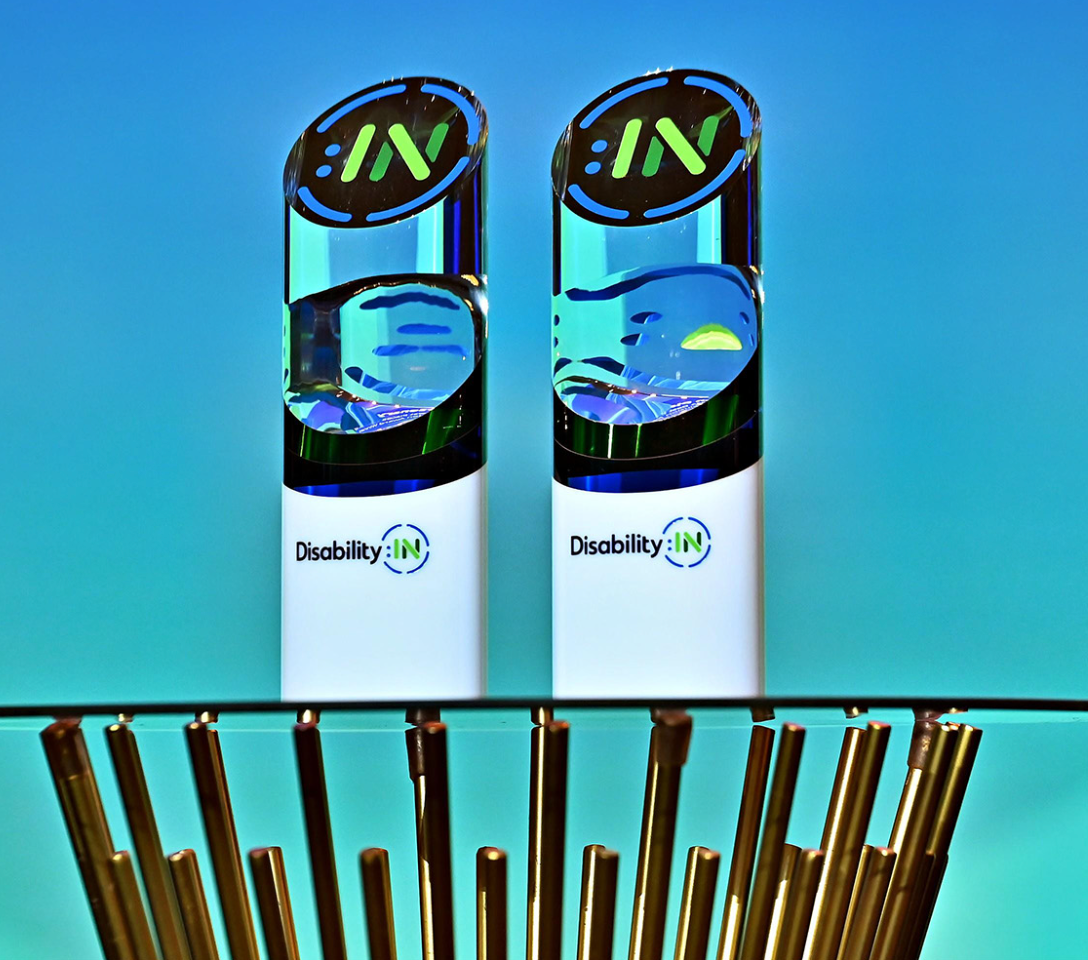 Disability Inclusion award trophies featuring the DisabilityIN logo