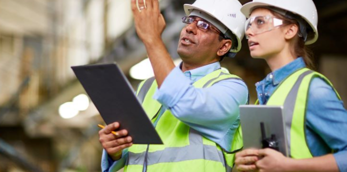Two Employees Working in the Energy Field