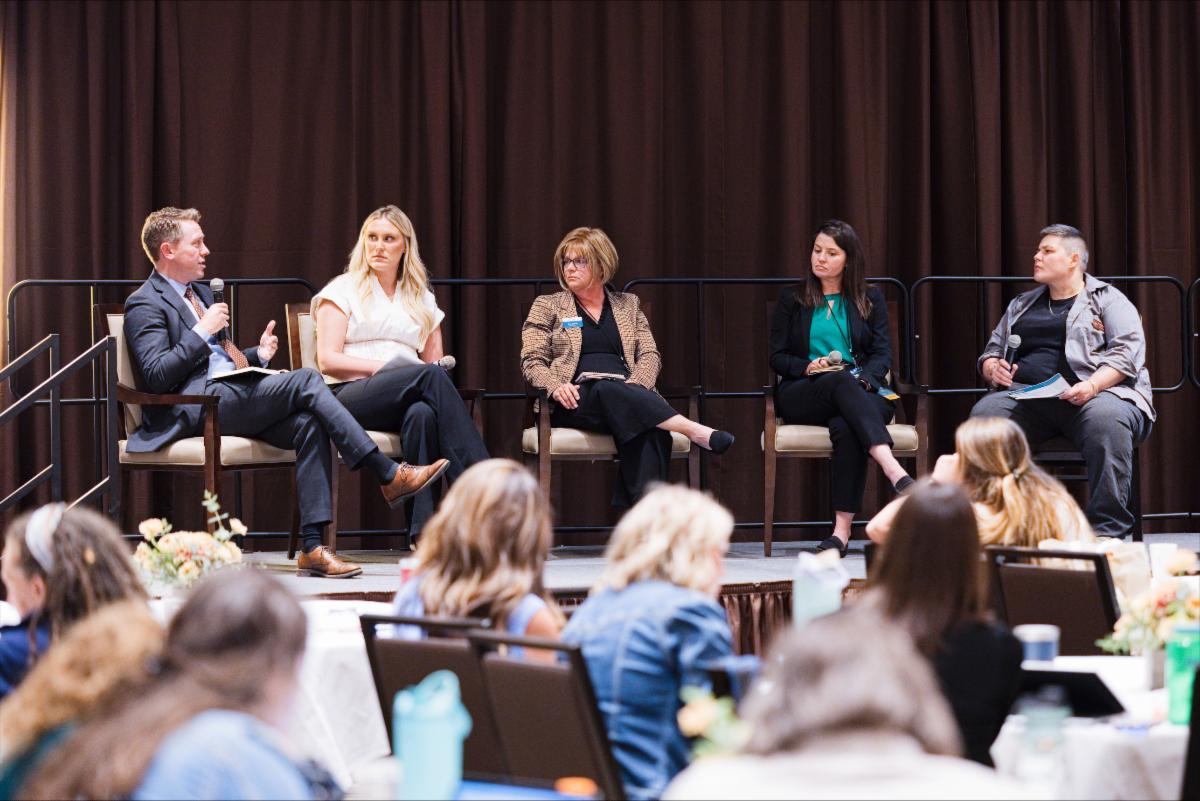 Speakers on stage at the 2026 Wyoming Maternal Health Summit