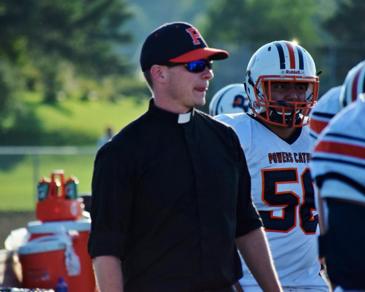 Fr Jim Football Team.jpg