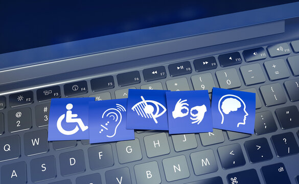 Laptop keyboard with accessibility symbols.
