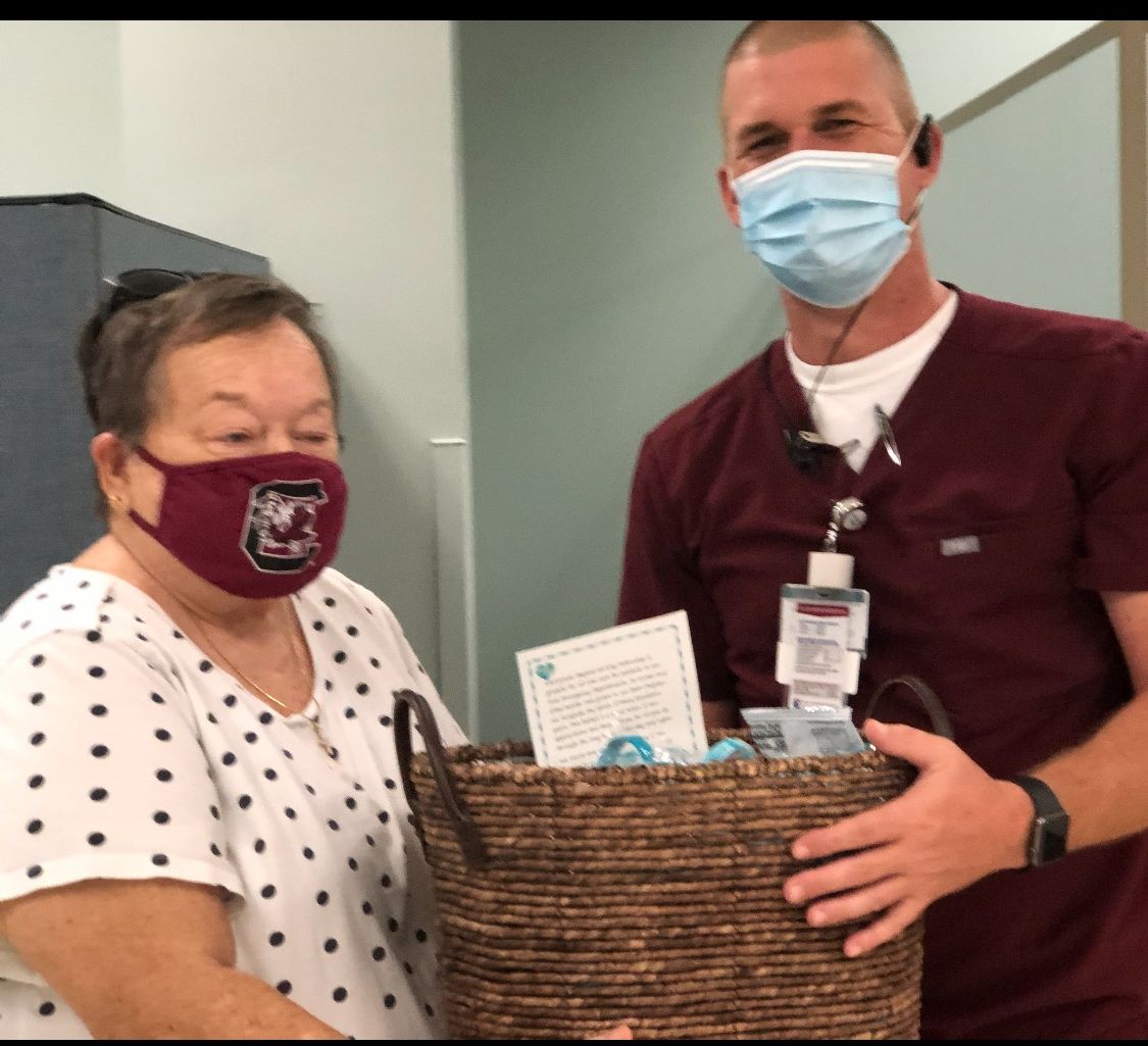 Fran delivering basket to ED.jpg