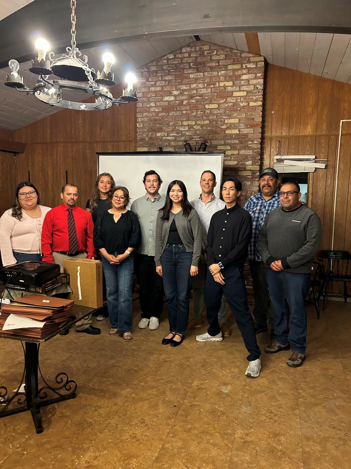 CED Clinic team members posing in Salinas when meeting client