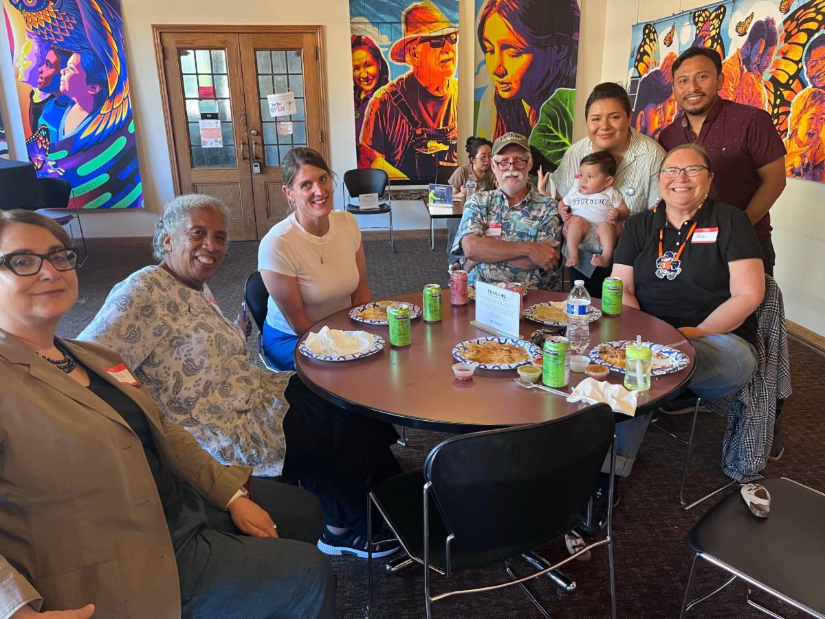 CFA members and their families gathered at the University YMCA for the fall semester kickoff