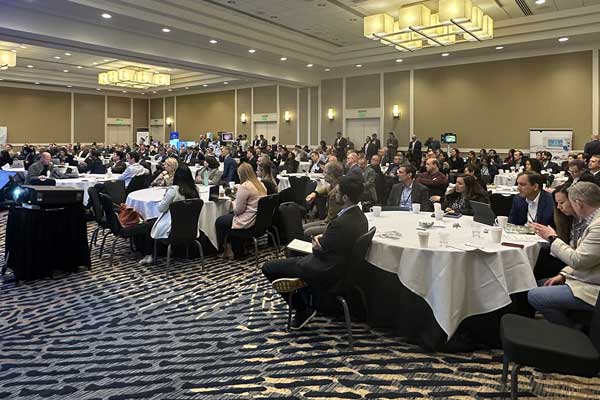 SAGES conference photograph of entire room of attendees