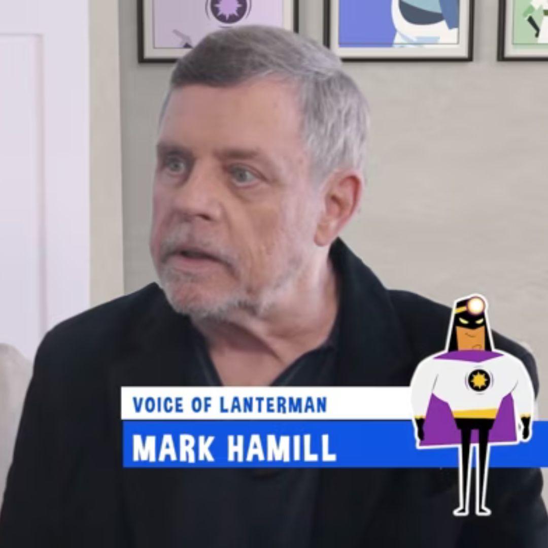 Man with short gray hair and a trimmed beard looking to the side with text on screen that says voice of Lanterman Mark Hamill and a small animated character in the corner
