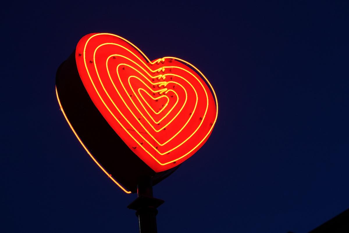 red neon light in the shape of a heart