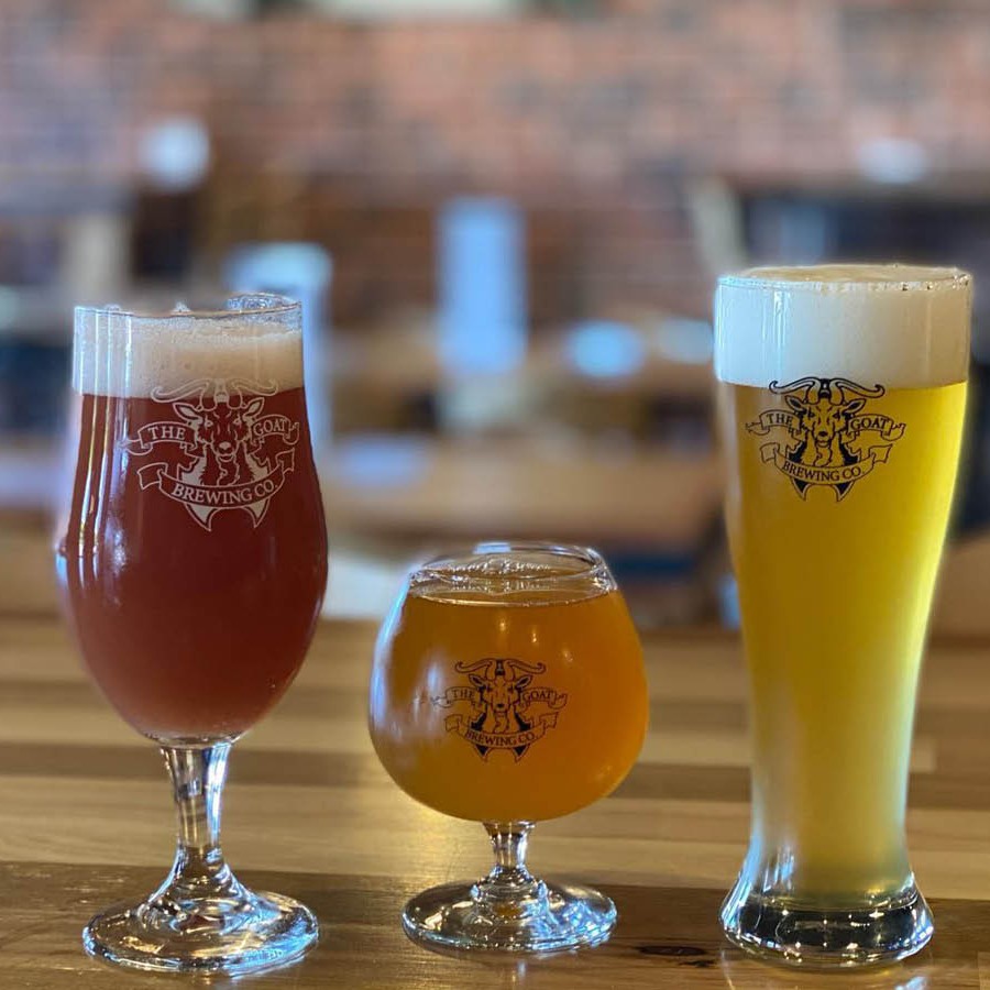 3 glasses of beer on a table