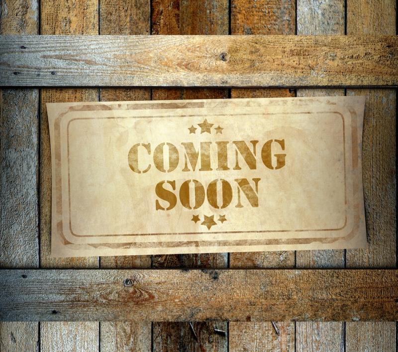 Stamp Coming Soon label on old wooden box