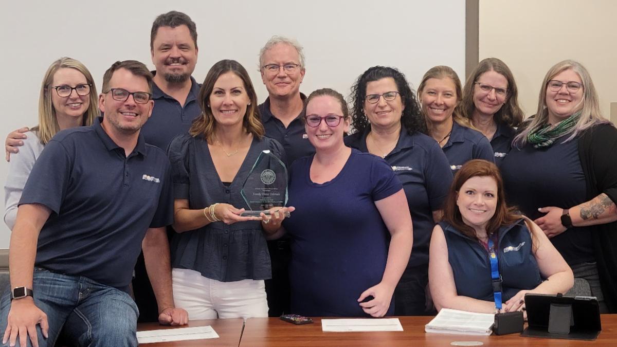 Staff of CCDHHDB poses with the recipients of the 2023 Susan J Elliot Award Hands and Voices
