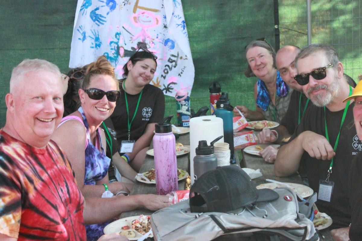 4-H camp chaperones posing for the camera