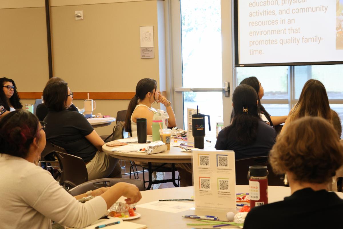Attendees of the September 2026 Quarterly Partner Meeting engaging in a presentation